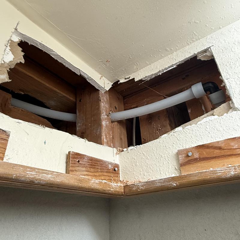 PEX water line reroute behind wall and ceiling trim