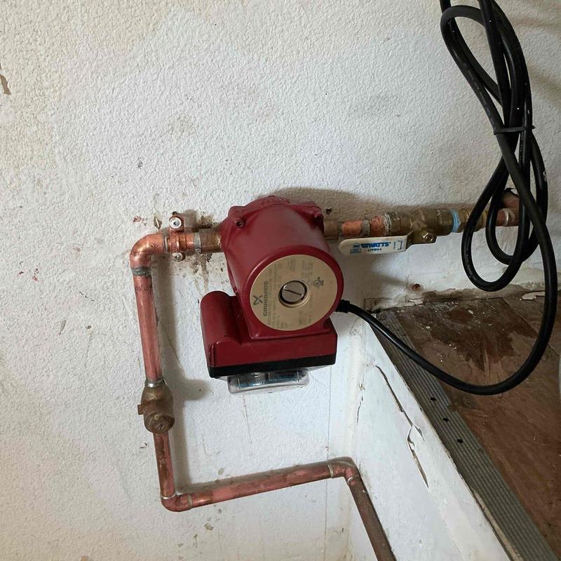 Hot water recirculation pump with copper piping installation