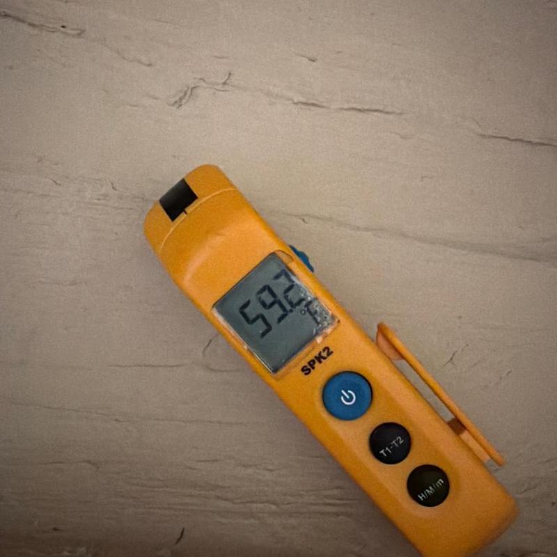 Digital thermometer showing 59.2°F supply air temperature Digital thermometer showing 59.2°F supply air temperature