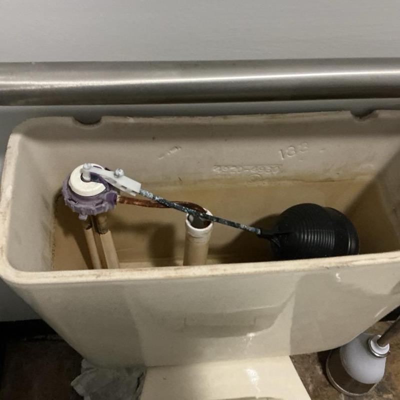 Toilet fill valve and float mechanism inside tank Toilet fill valve and float mechanism inside tank