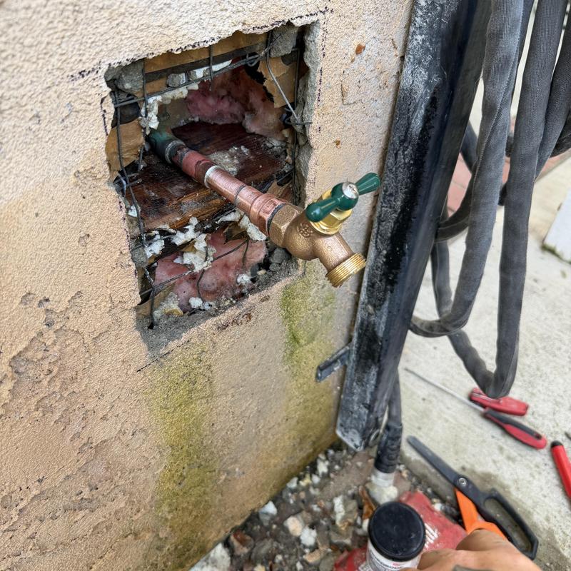 Hose bib installation with copper piping in stucco wall