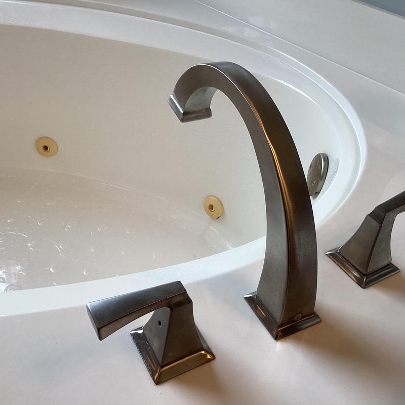 Garden tub faucet with hot and cold handles