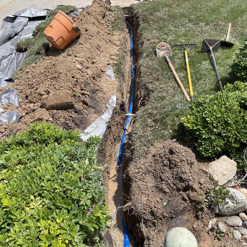 PEX A piping trench with tracer wire installation