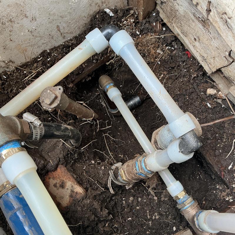 Well pressure switch and piping inside well housing