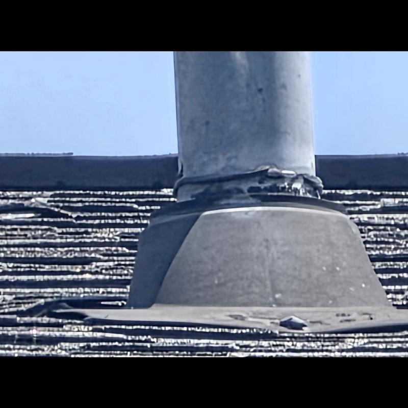 Roof pipe boot with visible sealing damage Roof pipe boot with visible sealing damage