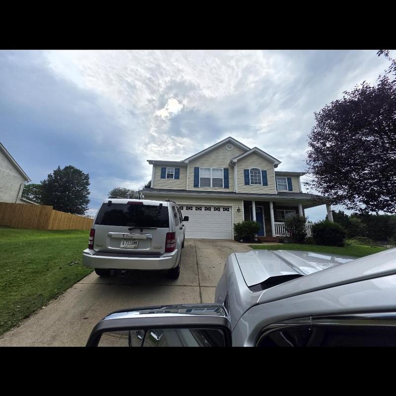 Pipe boot inspection on residential roof in Greer, SC Pipe boot inspection on residential roof in Greer, SC