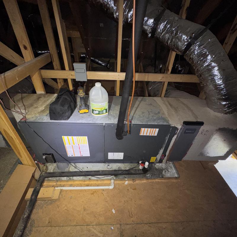 Heat pump air handler unit with tools and cleaner