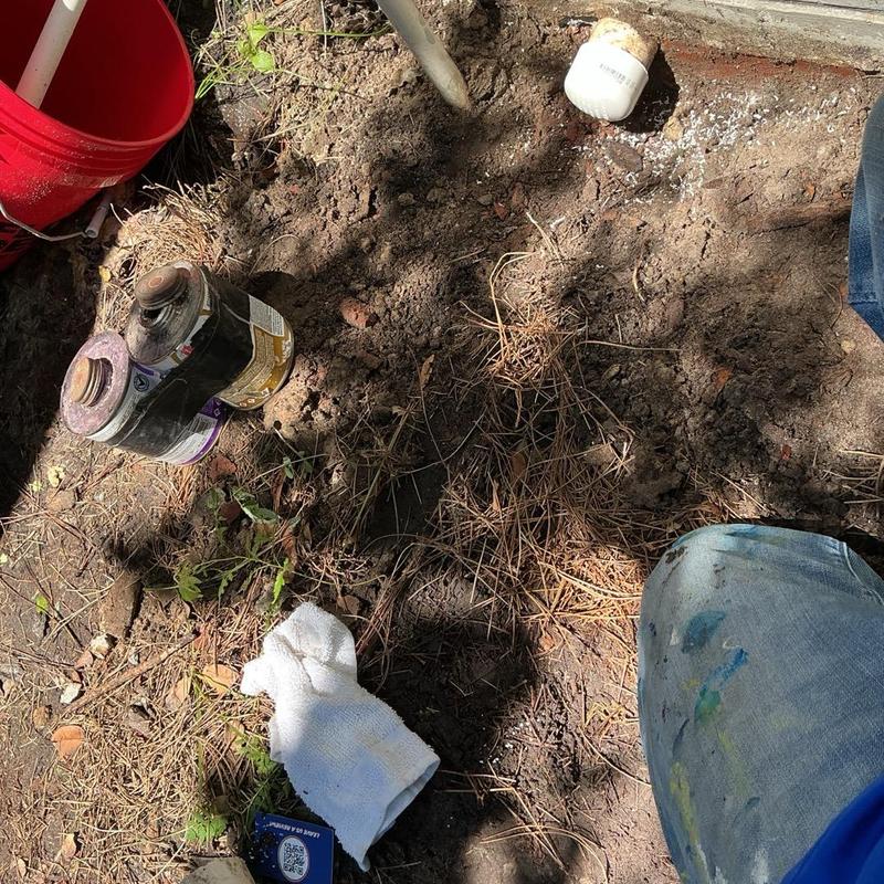 Ice maker water line capped outdoors near foundation dirt Ice maker water line capped outdoors near foundation dirt