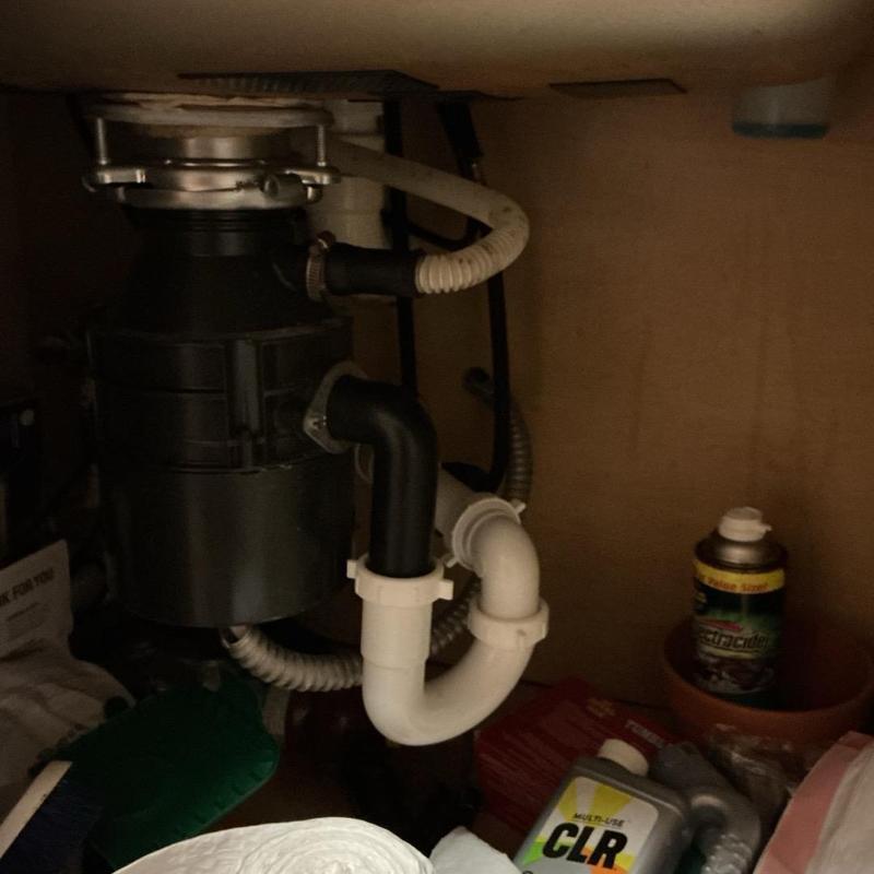 Kitchen sink drain and garbage disposal plumbing under cabinet Kitchen sink drain and garbage disposal plumbing under cabinet