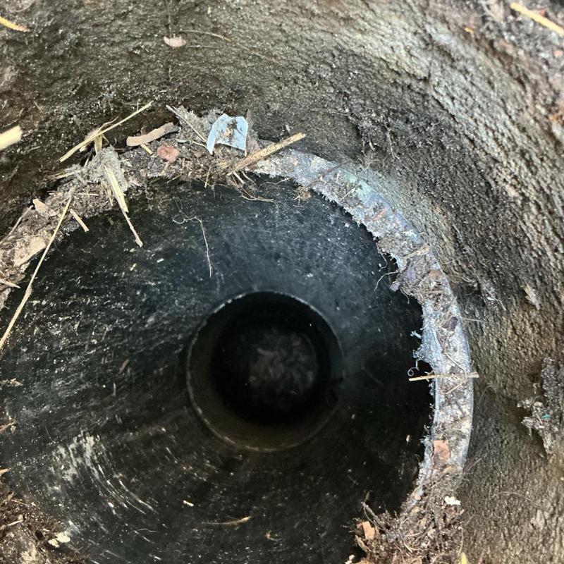 Sewer line interior showing cleared debris and dirt edges Sewer line interior showing cleared debris and dirt edges