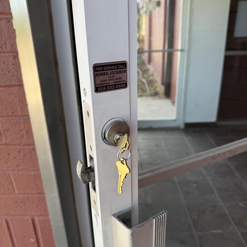 Commercial door lock with keys in cylinder Commercial door lock with keys in cylinder