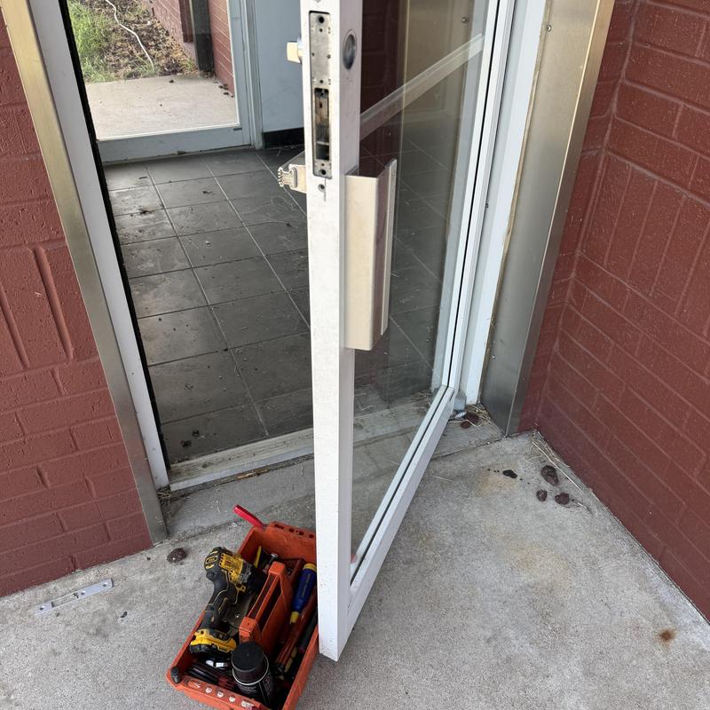 Glass door lock rekeying with locksmith toolbox Glass door lock rekeying with locksmith toolbox