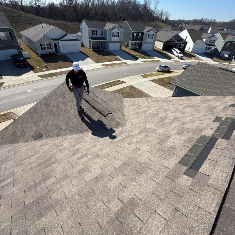 Asphalt shingle roof inspection with visible flashings
