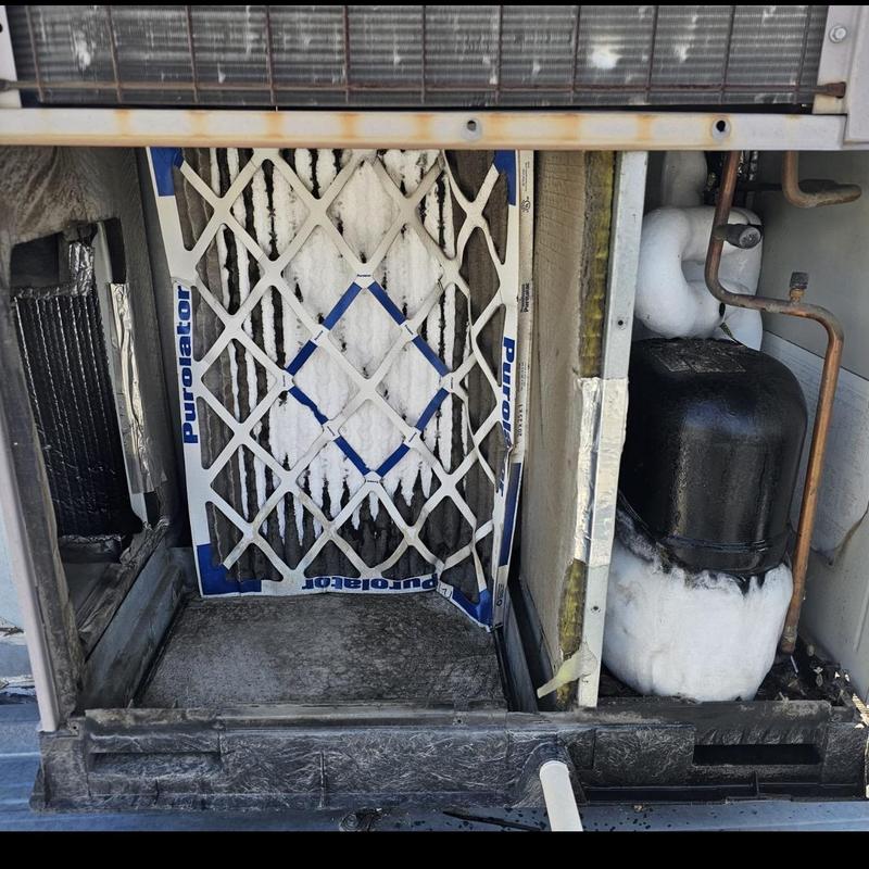 Evaporator coil frozen with dirty air filter inside unit Evaporator coil frozen with dirty air filter inside unit