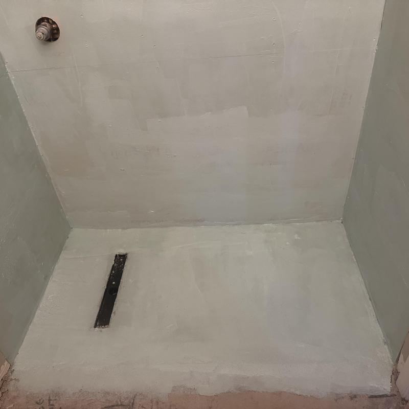 Shower waterproofing membrane applied before tile installation Shower waterproofing membrane applied before tile installation