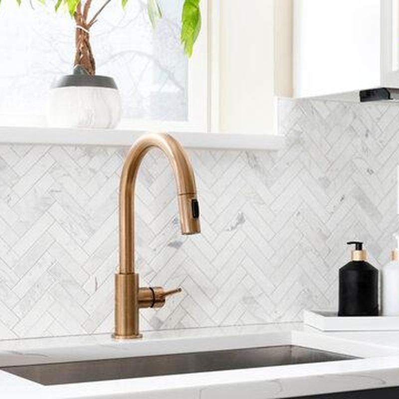 Kitchen sink faucet with modern bronze finish