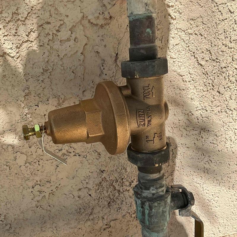1-inch water pressure regulator valve on pipe