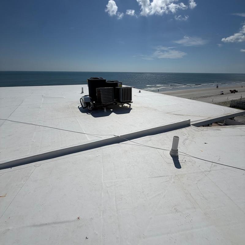TPO roofing system with rooftop HVAC unit TPO roofing system with rooftop HVAC unit
