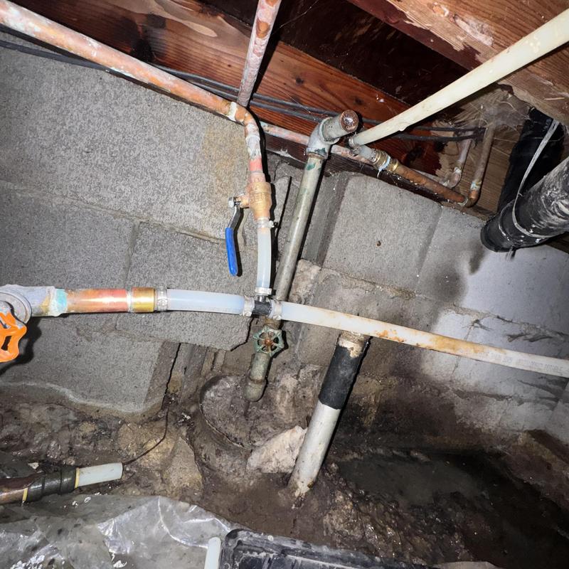 Copper and PEX water line with ball valve in crawl space Copper and PEX water line with ball valve in crawl space