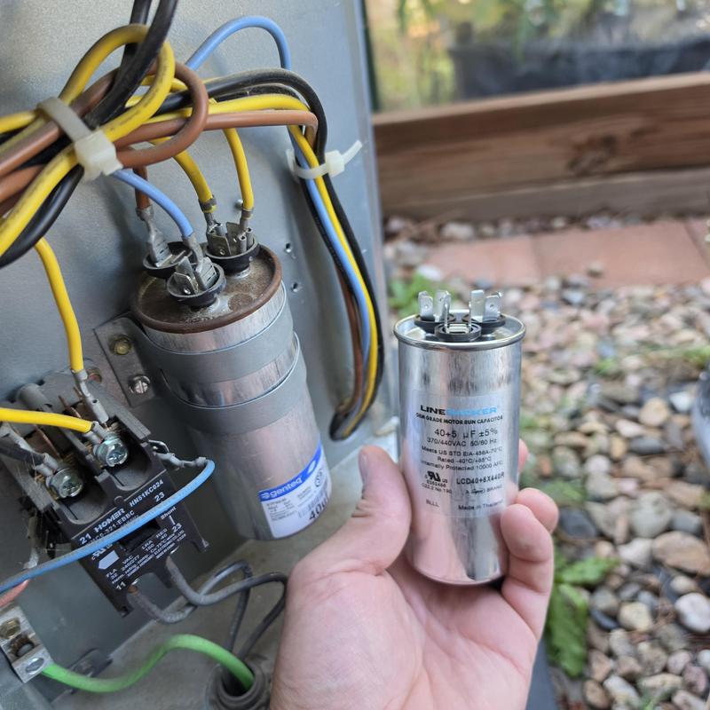 Air conditioner capacitor replacement with wiring visible Air conditioner capacitor replacement with wiring visible