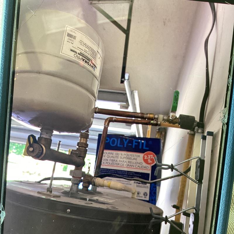Expansion tank assembly on water heater system