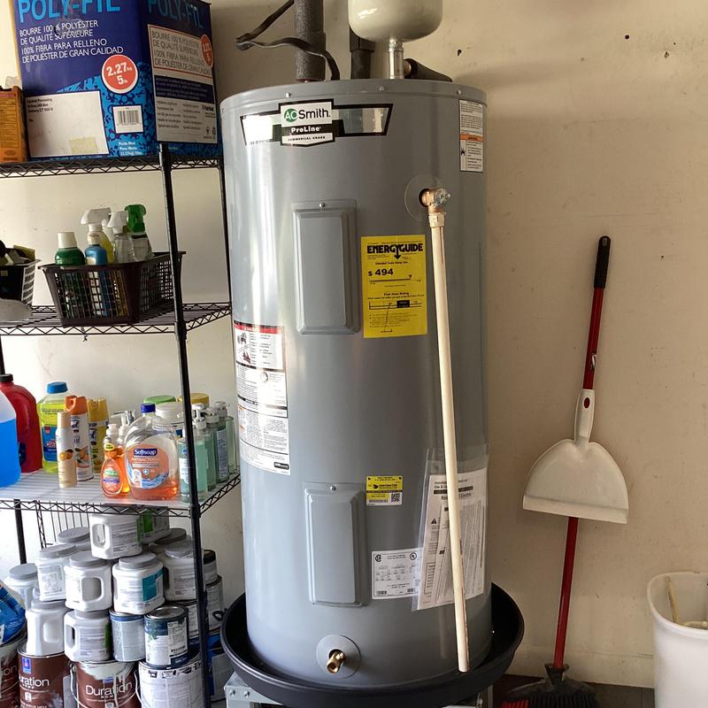 A.O. Smith electric water heater installation in garage