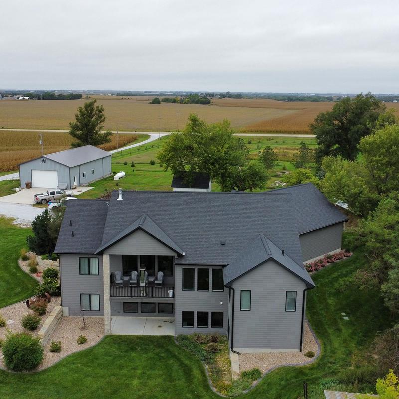 Owens Corning AR impact resistant roof shingles on house Owens Corning AR impact resistant roof shingles on house