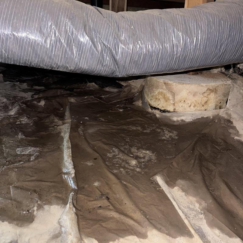 Crawl space with sewage backup and drain pipe Crawl space with sewage backup and drain pipe
