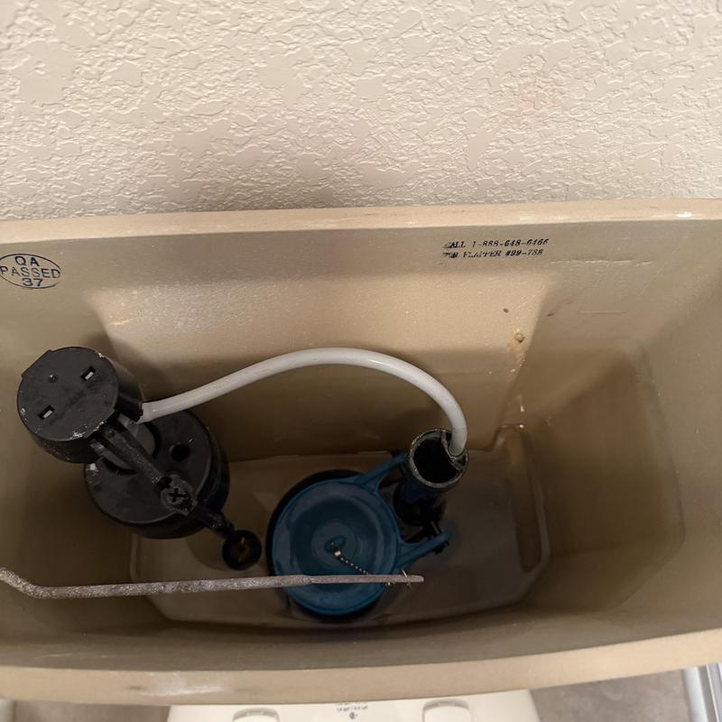 Toilet flush valve and fill valve assembly inside tank Toilet flush valve and fill valve assembly inside tank