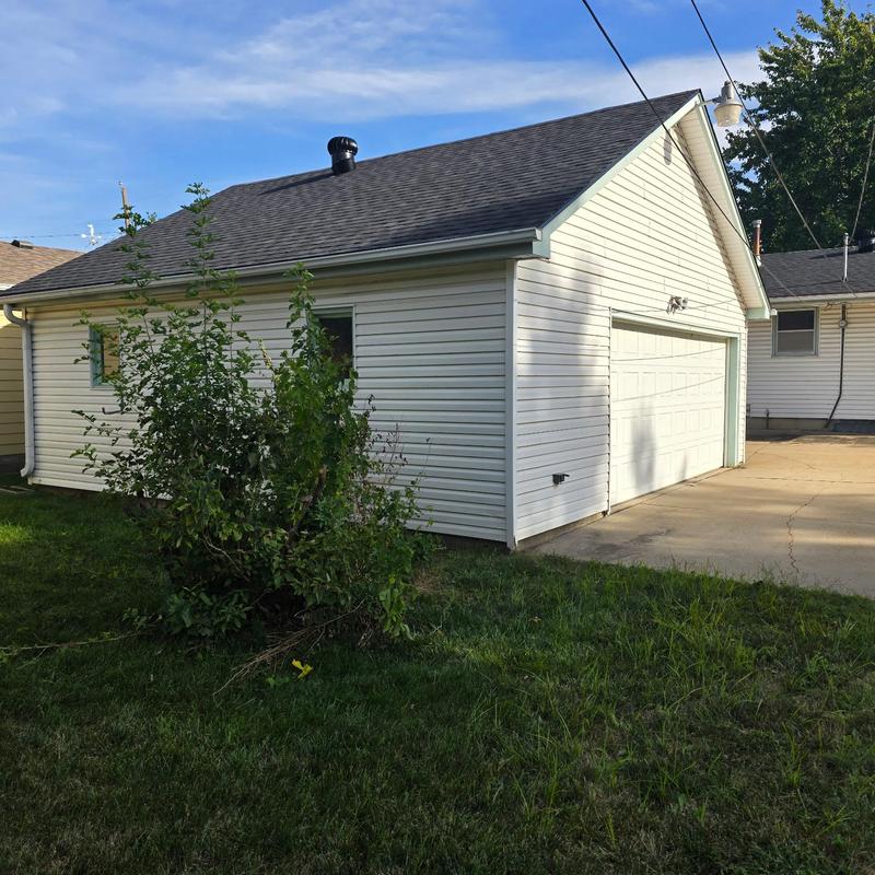 Tamko Titan XT impact resistant shingle roof on garage Tamko Titan XT impact resistant shingle roof on garage