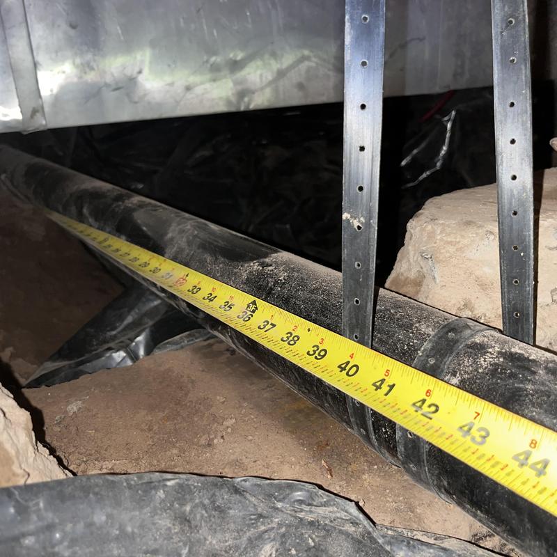 Cast iron pipe removal and ABS drain installation with tape measure Cast iron pipe removal and ABS drain installation with tape measure