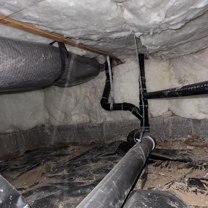 Kitchen sink drain pipes and ductwork in crawlspace insulation Kitchen sink drain pipes and ductwork in crawlspace insulation