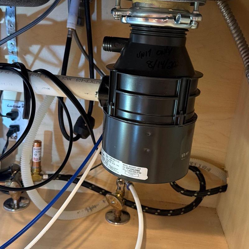 Garbage disposal unit under kitchen sink installation Garbage disposal unit under kitchen sink installation