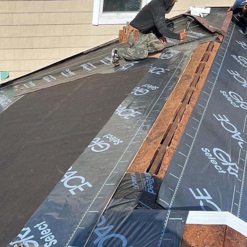 Ice and water shield roofing installation on roof deck Ice and water shield roofing installation on roof deck