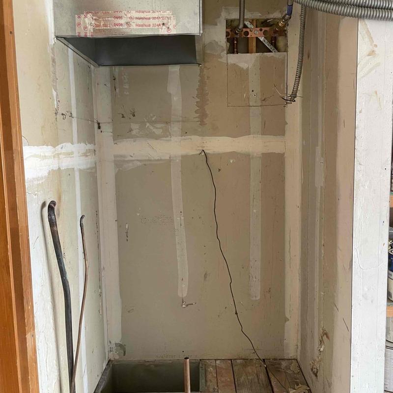 Electric furnace installation space with ductwork and wiring