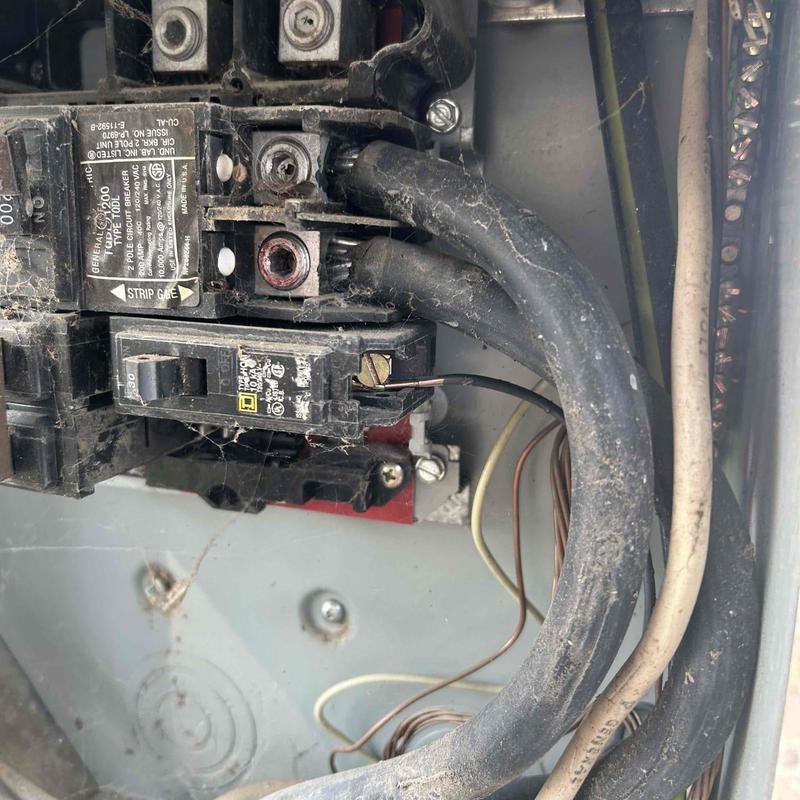 Circuit breaker with electrical wiring in panel box