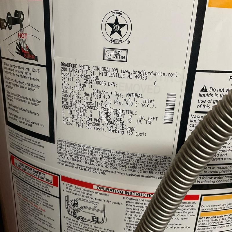Water heater label with model and safety info