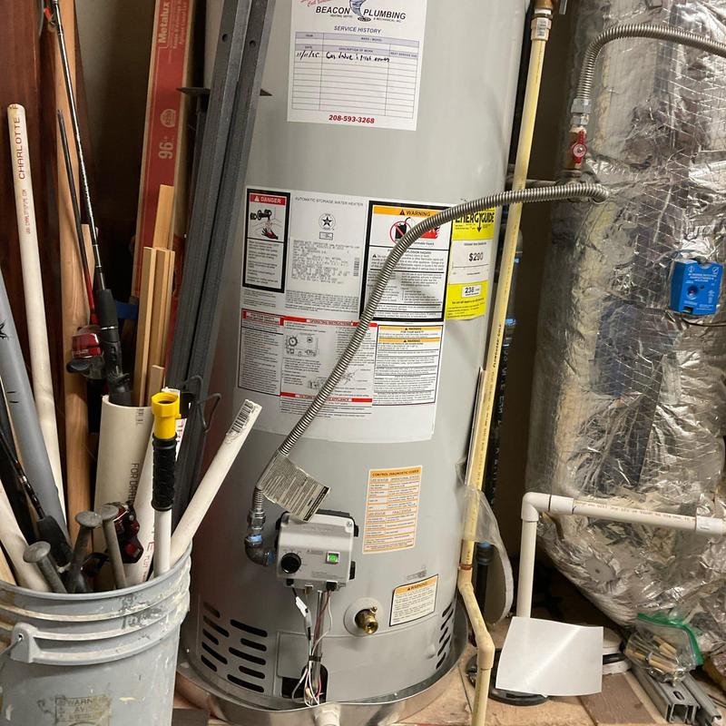 Gas water heater with replaced control valve and pilot assembly