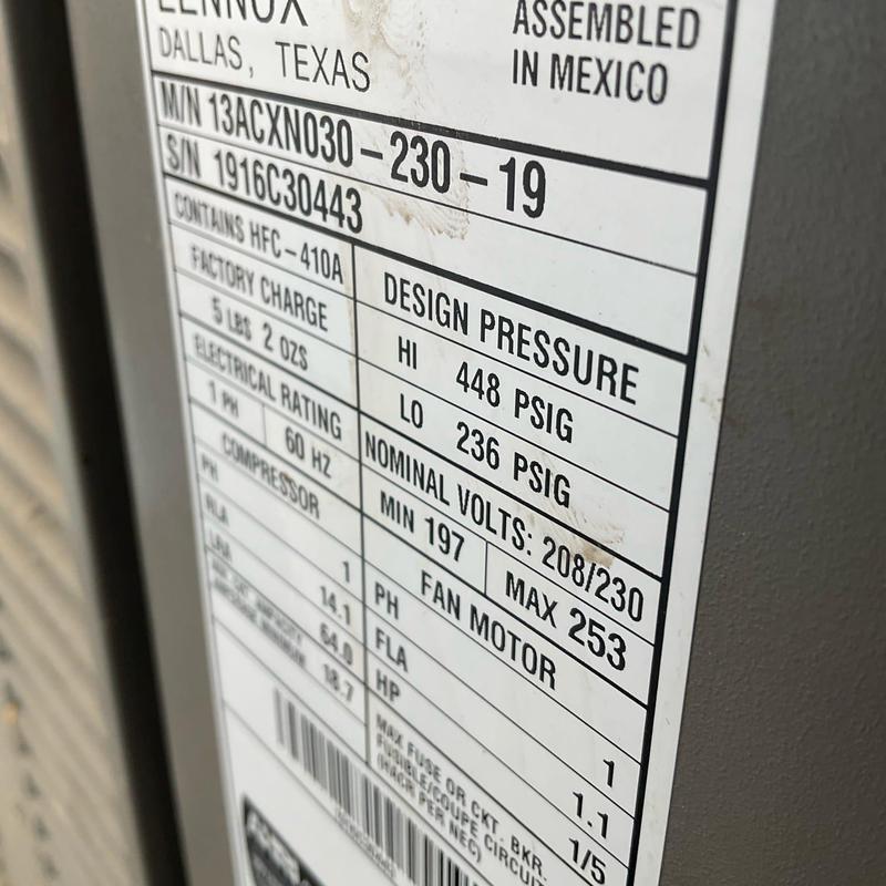 Air conditioner unit specification label showing pressure ratings