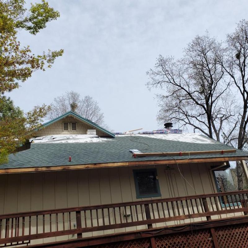 GAF asphalt roof with leaf blaster and gutter guards