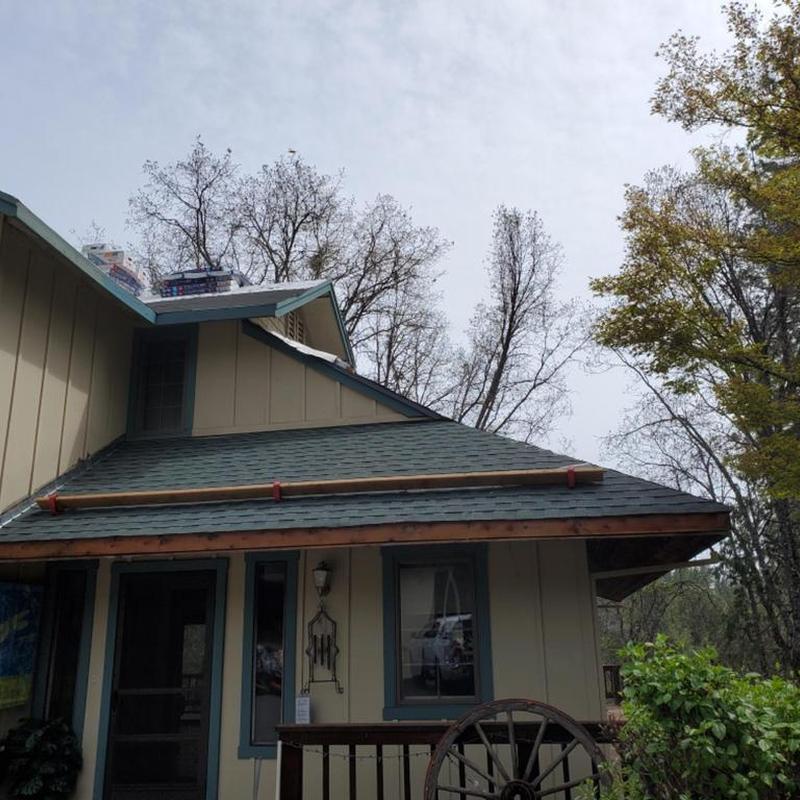 GAF asphalt roof with leaf blaster and gutter guards