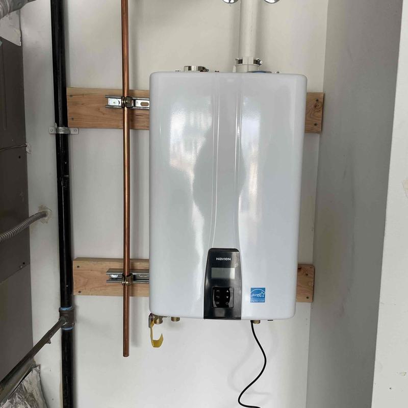 Tankless water heater with new copper piping installation