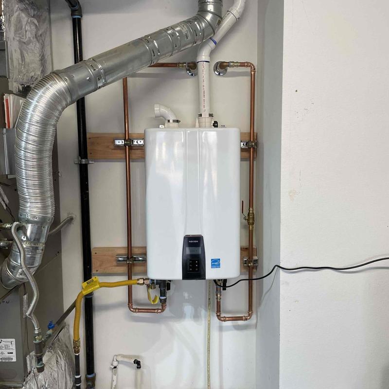 Tankless water heater with new copper piping installation