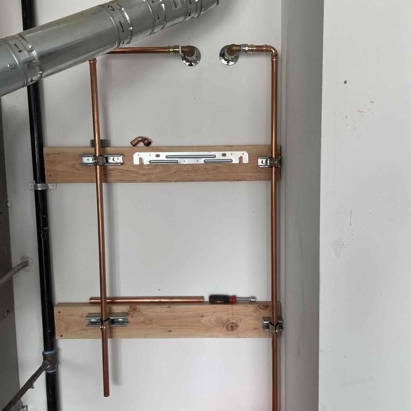 Copper water and gas lines for tankless heater installation