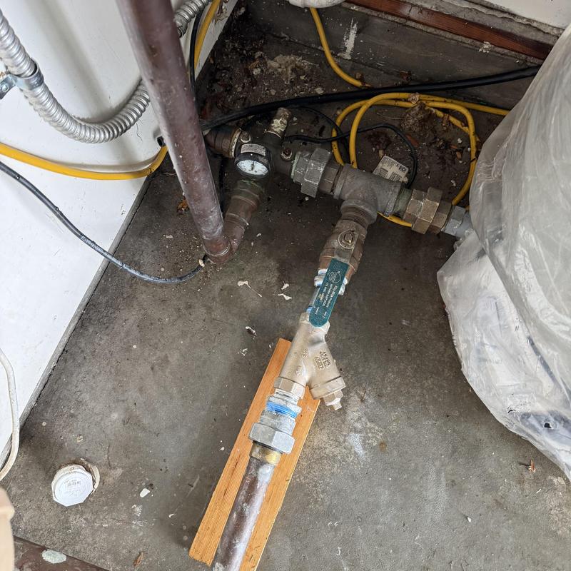 Well system pipe with pressure gauge and valve installation Well system pipe with pressure gauge and valve installation