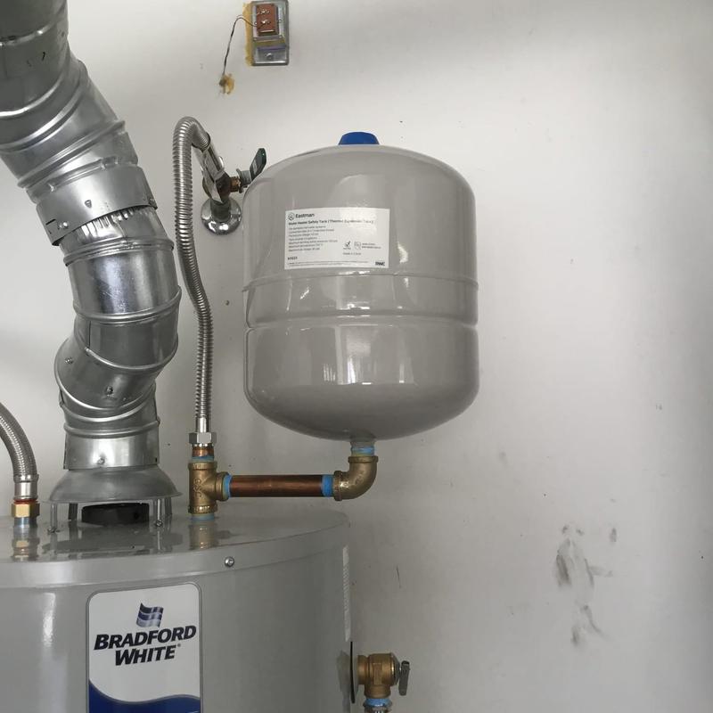 Water heater expansion tank installation with copper piping