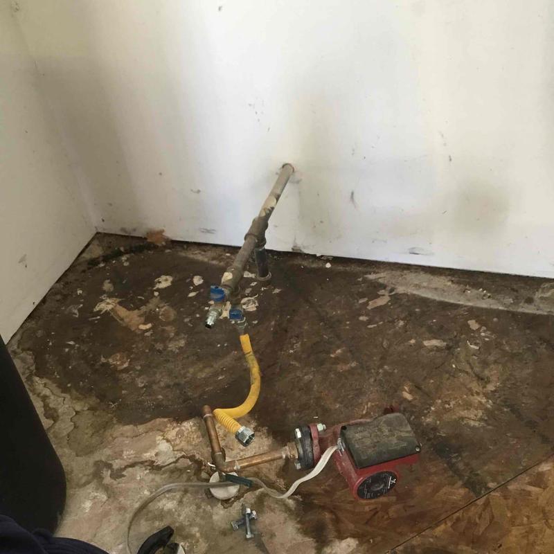Water heater gas flex and recirculating pump installation area