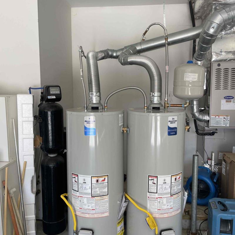 Gas water heater installation with expansion tank and piping