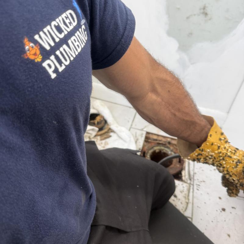 Main sewer line clearing with plumbing tool Main sewer line clearing with plumbing tool