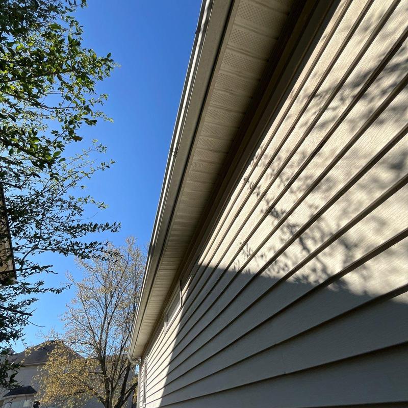 Gutter and soffit system on residential home exterior